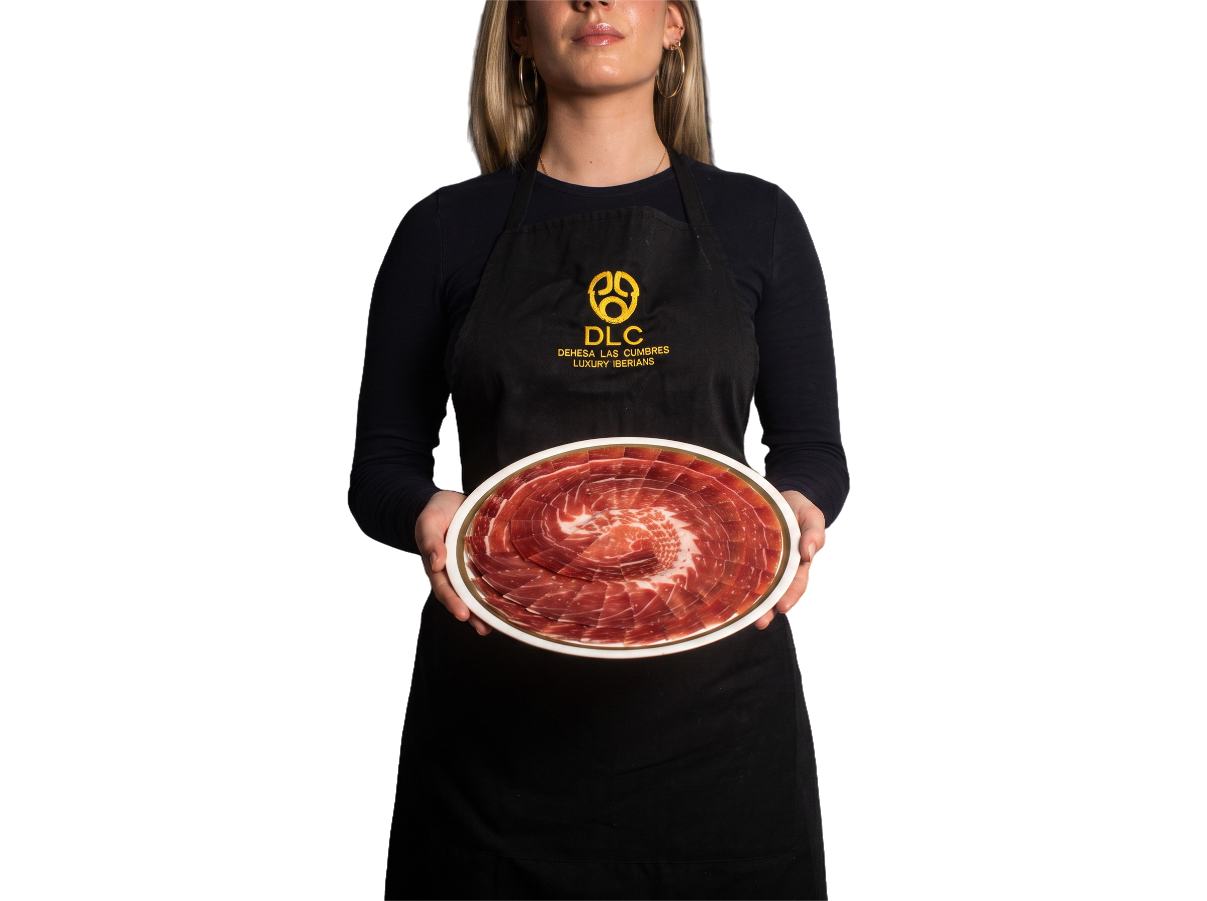 Plato de jam&oacute;n ib&eacute;rico cortado a cuchillo en atm&oacute;sfera protectora de Dehesa Las Cumbres